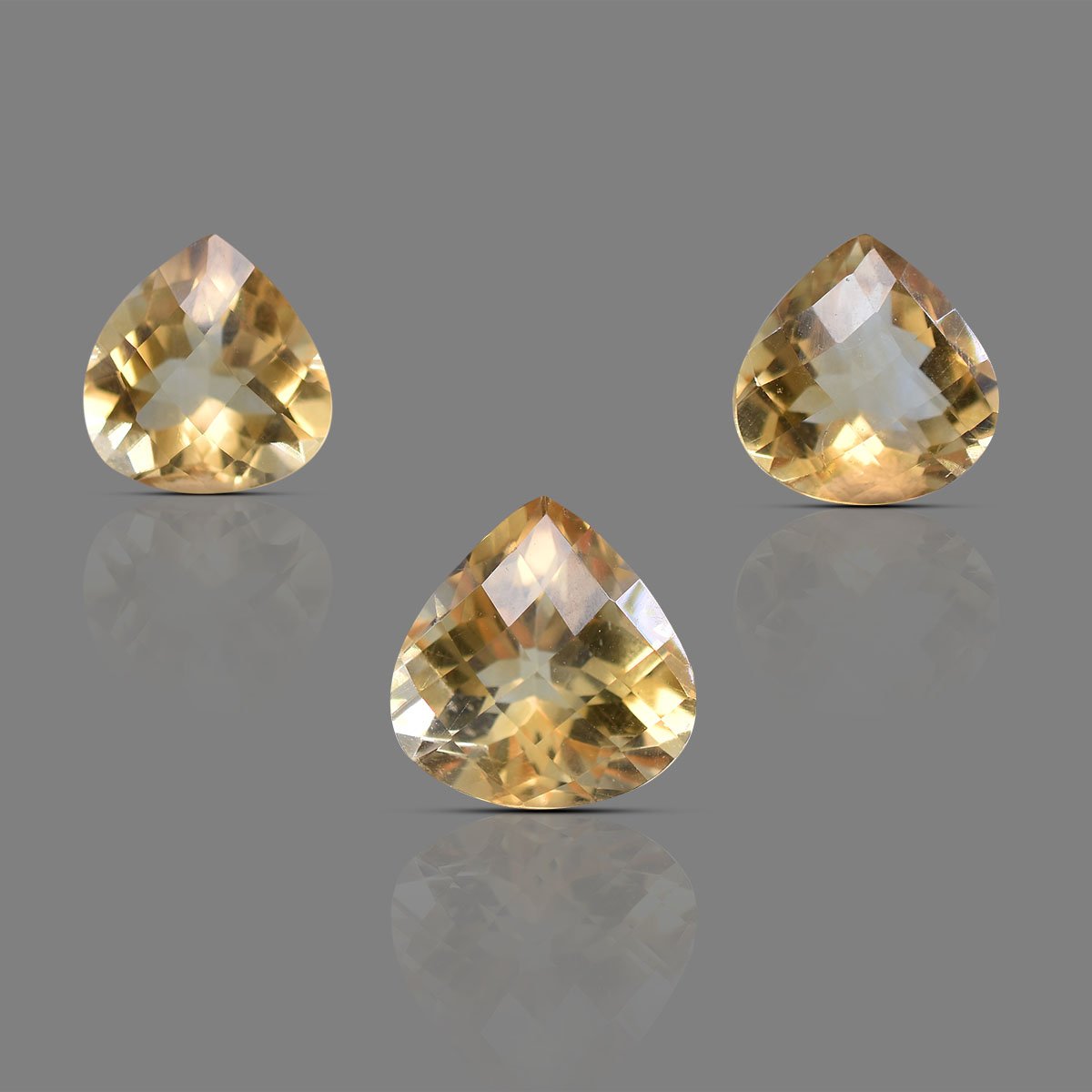 rg-citrin-pear-3pcs-carv-13-1 18.63 carats Citrine ( 20.70 ratti Sunela ) 3 pcs Set - Image 1