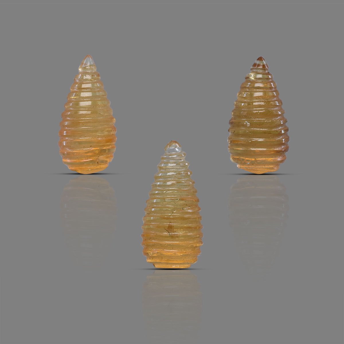 rg-citrin-pyramid-3pcs-carv-16-1 Natural Citrine Beehive Carving Matching Gemstone 3 pcs Set - Image 1
