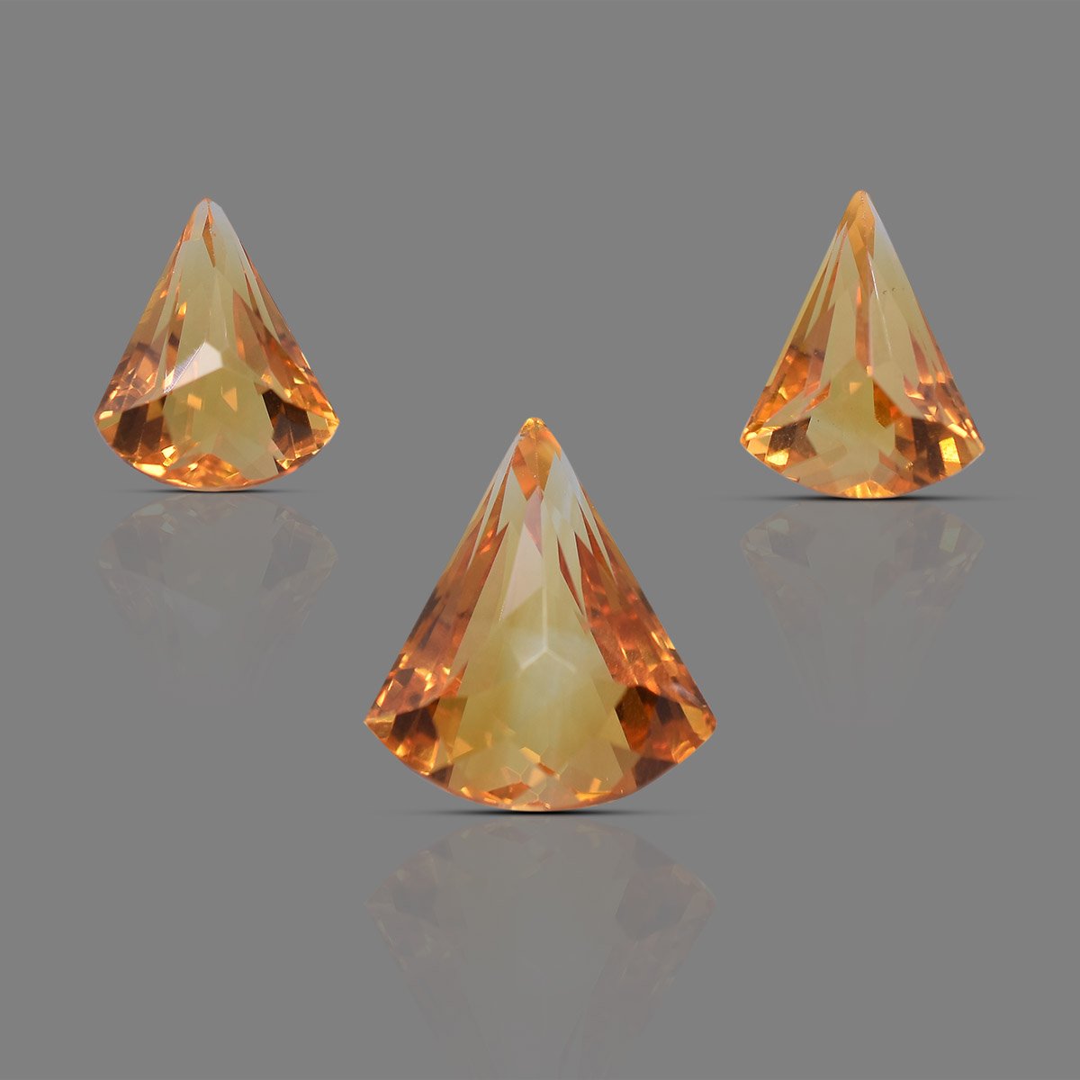 rg-citrin-trillion-3pcs-carv-15-1 Natural Citrine Trillion Shape Carved Gemstone 3 pcs Set - Image 1
